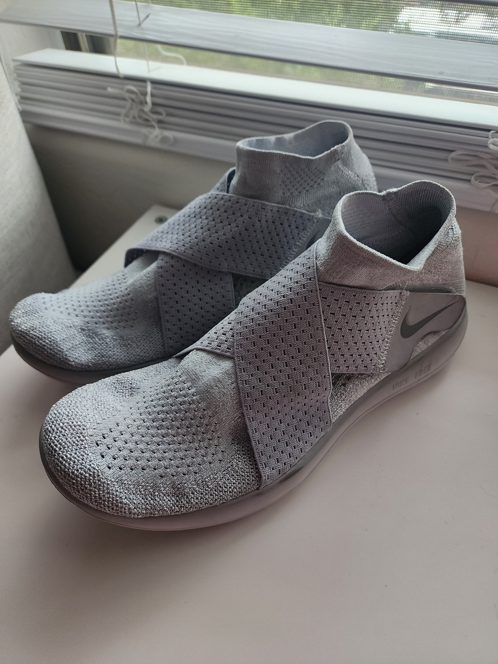 Nike Women’s Grey Free Run Slip-On Knit Sneakers